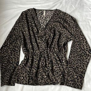 Cheetah long sleeve peplum top